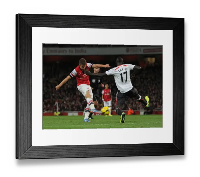 Framed Print : Ramsey Strikes Again: Arsenal's Number 8 Scores Dramatic Goal Past Sakho in Arsenal v Liverpool Clash (2013-14) Framed Print : Ramsey Strikes Again: Arsenal's Number 8 Scores Dramatic Goal Past Sakho in Arsenal v Liverpool Clash (2013-14)
