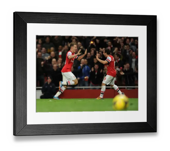 Framed Print : Arsenal's Double Act: Ramsey and Cazorla Celebrate Goals Against Liverpool (2013-14) Framed Print : Arsenal's Double Act: Ramsey and Cazorla Celebrate Goals Against Liverpool (2013-14)