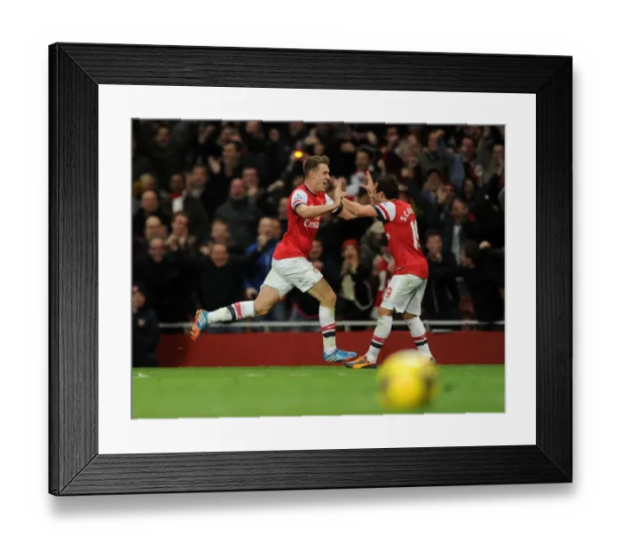 Framed Print : Arsenal's Double Delight: Ramsey and Cazorla's Unforgettable Goal Celebration (2013-14)