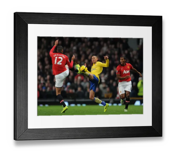 Framed Print : Clash at Old Trafford: Gibbs vs. Smalling - Manchester United vs. Arsenal, Premier League 2013-14