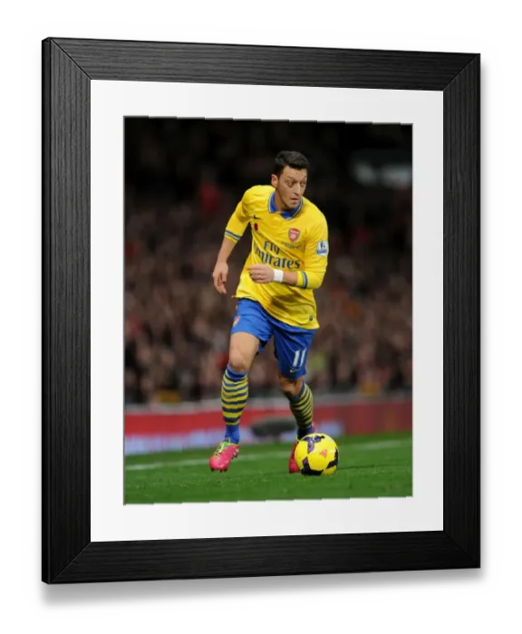 Framed Print : Mesut Ozil: Clash at Old Trafford (2013-14) - Premier League Showdown between Manchester United and Arsenal Framed Print : Mesut Ozil: Clash at Old Trafford (2013-14) - Premier League Showdown between Manchester United and Arsenal