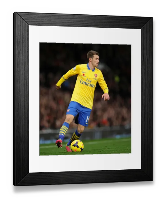Framed Print : Aaron Ramsey in Action: Manchester United vs. Arsenal, Premier League 2013-14