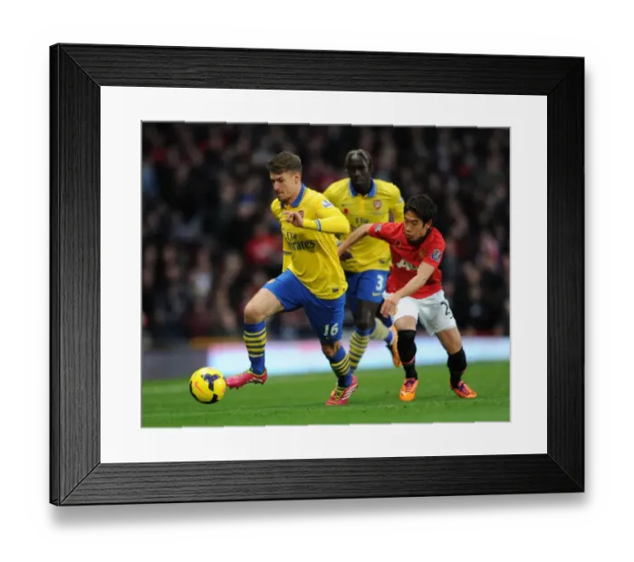 Framed Print : Ramsey Surges Past Kagawa: Manchester United vs. Arsenal, Premier League, 2013 Framed Print : Ramsey Surges Past Kagawa: Manchester United vs. Arsenal, Premier League, 2013