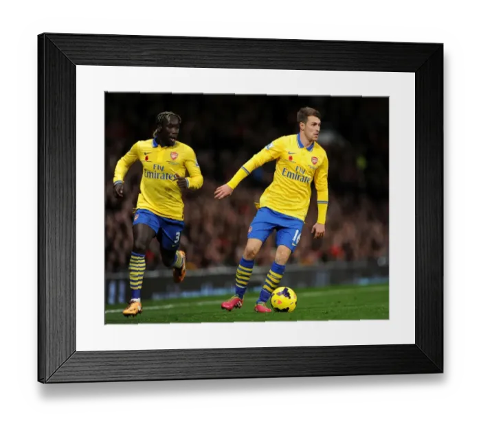 Framed Print : Sagna and Ramsey in Action: Manchester United vs. Arsenal, Premier League 2013-14 Framed Print : Sagna and Ramsey in Action: Manchester United vs. Arsenal, Premier League 2013-14
