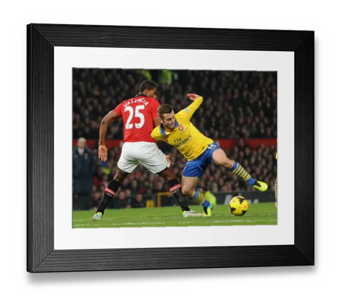 Framed Print : Jack Wilshere vs. Antonio Valencia: Battle at Old Trafford - Manchester United vs. Arsenal, Premier League 2013-14