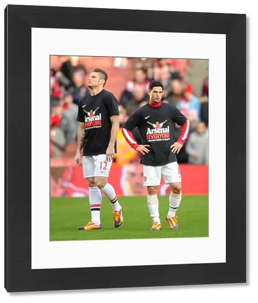 Olivier Giroud and Mikel Arteta (Arsenal) in their Arsenal for Everyone Tshirts. Arsenal 2