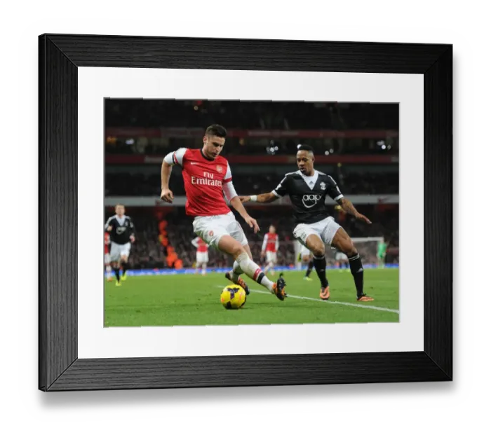 Framed Print : Intense Battle: Giroud vs Clyne - Arsenal vs Southampton, Premier League 2013-14