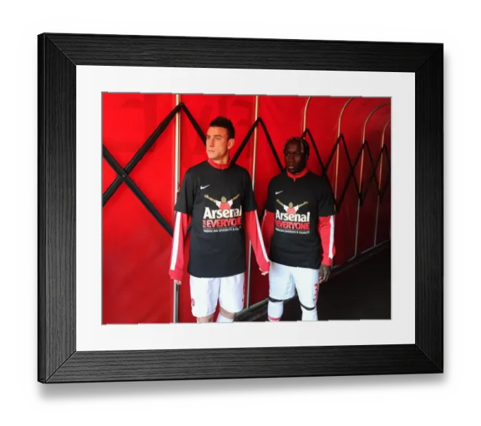 Framed Print : Laurent Koscielny and Bacary Sagna (Arsenal) in their Arsenal for Everyone Tshirts Framed Print : Laurent Koscielny and Bacary Sagna (Arsenal) in their Arsenal for Everyone Tshirts