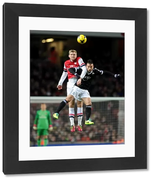 Per Mertesacker (Arsenal) Dani Osvaldo (Southampton). Arsenal 2: 0 Southampton. Barclays