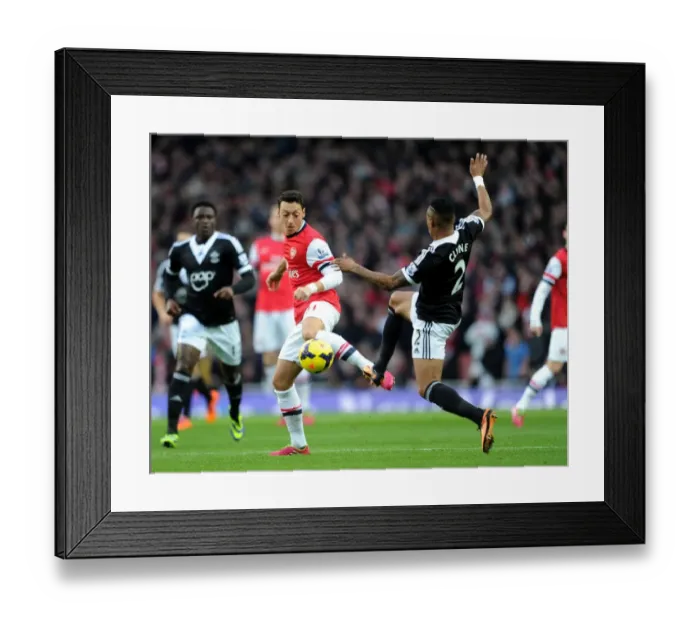 Framed Print : Mesut Ozil vs. Nathaniel Clyne: Intense Battle at Arsenal v Southampton (2013-14)