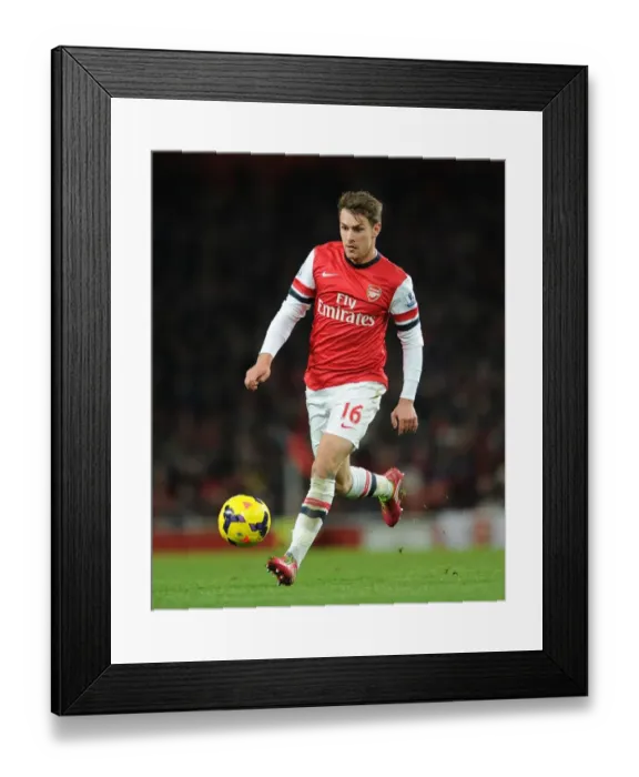 Framed Print : Arsenal's Aaron Ramsey in Action against Southampton (2013-14)