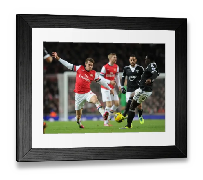Framed Print : Intense Battle: Ramsey vs. Wanyama - Arsenal vs. Southampton, Premier League 2013-14
