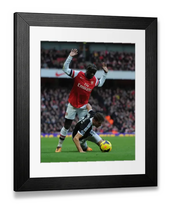 Framed Print : Arsenal vs Southampton: Bacary Sagna Clashes with Jay Rodriguez in Premier League Showdown