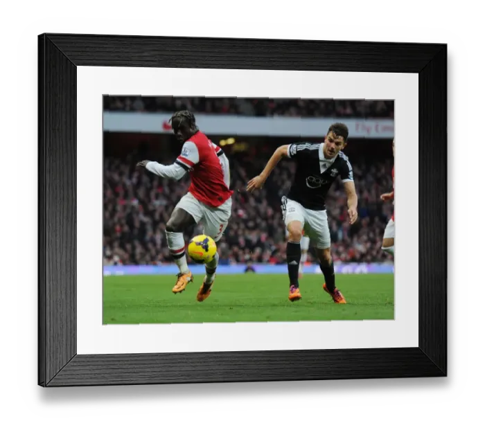 Framed Print : Sagna vs Rodriguez: A Premier League Showdown at Emirates Stadium Framed Print : Sagna vs Rodriguez: A Premier League Showdown at Emirates Stadium