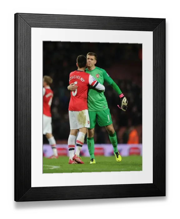 Framed Print : Arsenal's Szczesny and Koscielny: United in Victory after Arsenal v Southampton (2013-14)