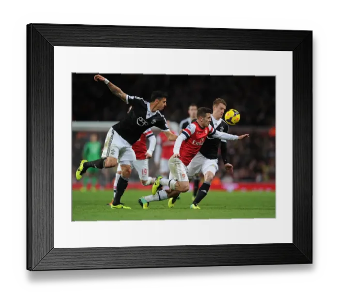 Framed Print : Arsenal's Jack Wilshere Drives Past Southampton's Defense in 2013-14 Premier League Clash