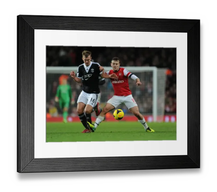 Framed Print : Clash of Midfield Titans: Wilshere vs Ward-Prowse in Arsenal vs Southampton, Premier League 2013-14