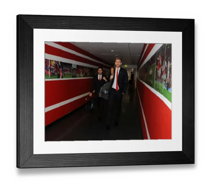Framed Print : Arsenal: Mertesacker and Arteta Head to Emirates Stadium for Champions League Clash against Marseille Framed Print : Arsenal: Mertesacker and Arteta Head to Emirates Stadium for Champions League Clash against Marseille