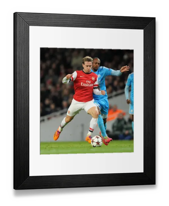 Framed Print : Clash of Champions: Monreal vs. Abdallah - Arsenal vs. Marseille (2013-14) Framed Print : Clash of Champions: Monreal vs. Abdallah - Arsenal vs. Marseille (2013-14)