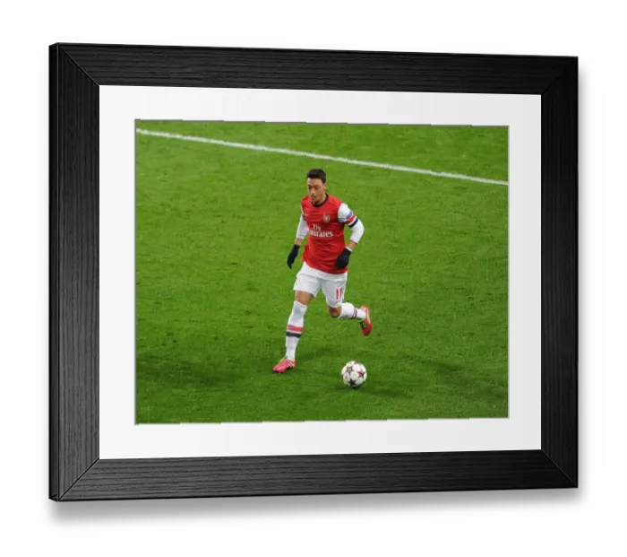 Framed Print : Mesut Ozil in Action: Arsenal vs. Olympique de Marseille, UEFA Champions League (2013)