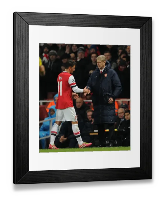 Framed Print : Mesut Ozil Bids Farewell to Arsene Wenger: Arsenal v Olympique de Marseille, 2013-14 UEFA Champions League Framed Print : Mesut Ozil Bids Farewell to Arsene Wenger: Arsenal v Olympique de Marseille, 2013-14 UEFA Champions League