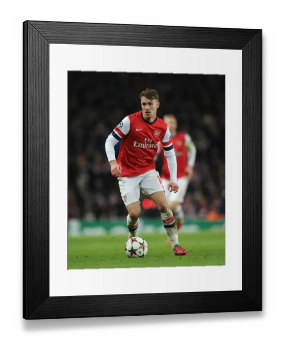 Framed Print : Aaron Ramsey in Action: Arsenal vs. Olympique de Marseille, UEFA Champions League (2013-14)