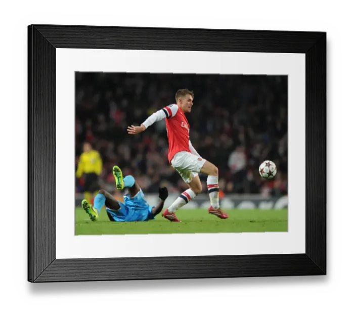 Framed Print : Aaron Ramsey (Arsenal). Arsenal 2: 0 Olympic Marseille. UEFA Champions League. Group F
