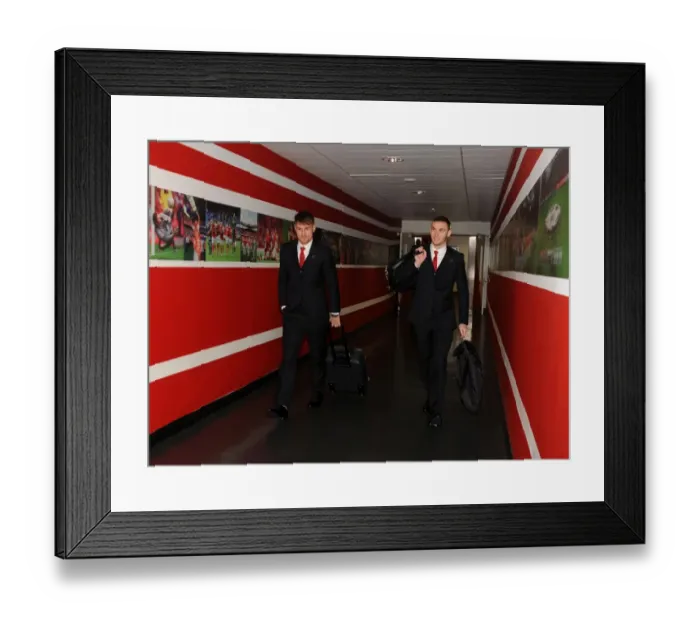 Framed Print : Arsenal Football Club: Ramsey and Vermaelen Approach Emirates Stadium for Champions League Clash Against Olympique de Marseille Framed Print : Arsenal Football Club: Ramsey and Vermaelen Approach Emirates Stadium for Champions League Clash Against Olympique de Marseille