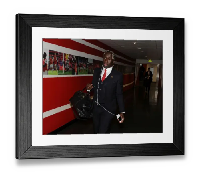 Framed Print : Bacary Sagna Heads to Emirates Stadium: Arsenal vs Marseille, UEFA Champions League, 2013