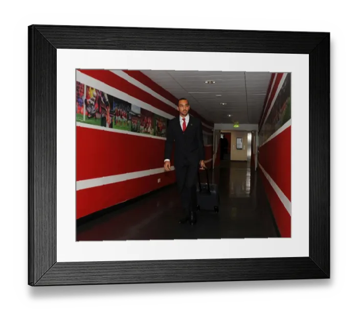Framed Print : Theo Walcott's Arrival: Arsenal vs. Olympique de Marseille, UEFA Champions League (2013)
