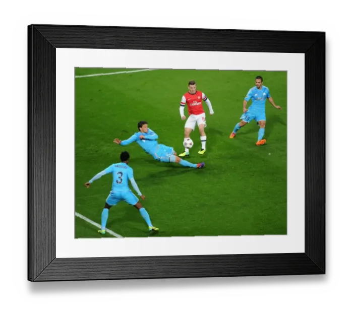 Framed Print : Jack Wilshere Scores the Winning Goal: Arsenal vs. Olympique de Marseille, UEFA Champions League, 2013