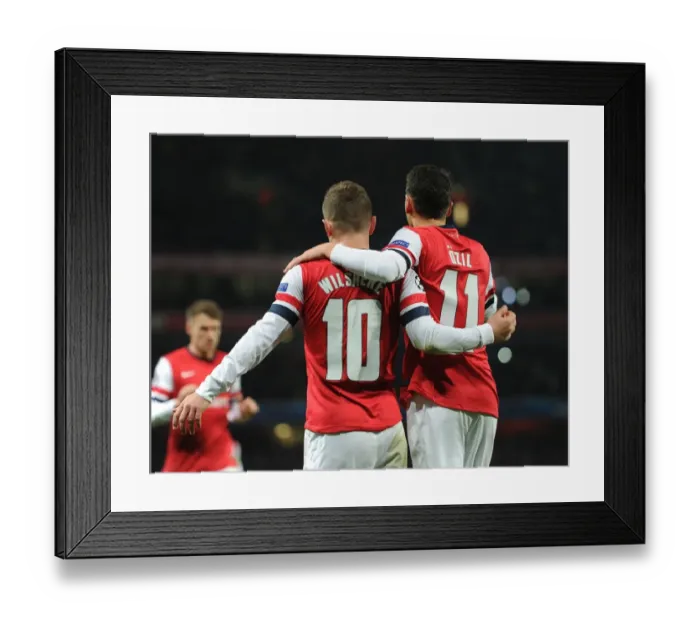 Framed Print : Jack Wilshere and Mesut Ozil Celebrate Goals: Arsenal vs Olympique de Marseille, UEFA Champions League, 2013 Framed Print : Jack Wilshere and Mesut Ozil Celebrate Goals: Arsenal vs Olympique de Marseille, UEFA Champions League, 2013