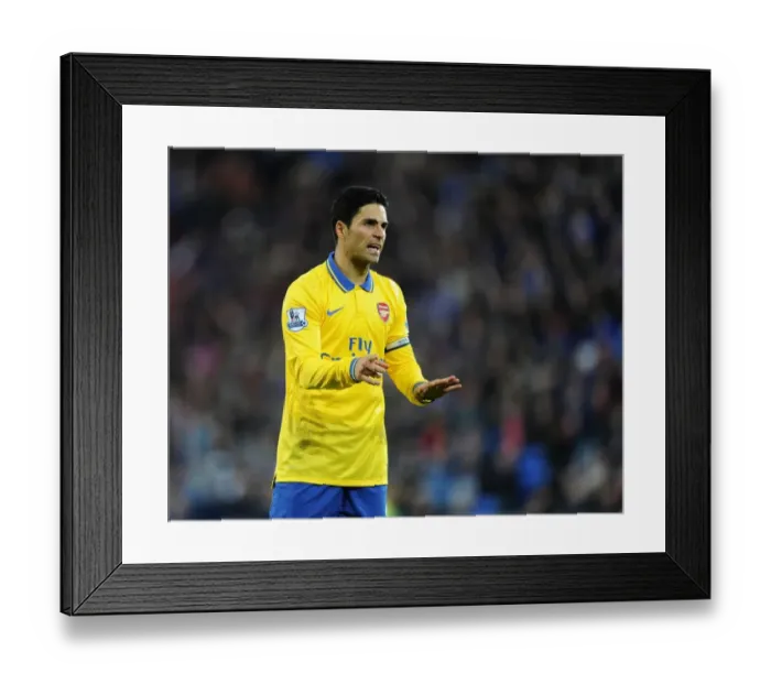 Framed Print : Mikel Arteta Leads Arsenal in Action against Cardiff City (2013-14) Framed Print : Mikel Arteta Leads Arsenal in Action against Cardiff City (2013-14)