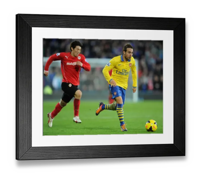 Framed Print : Santi Cazorla Dashes Past Kim Bo-Kyung: Cardiff City vs. Arsenal, Premier League, 2013