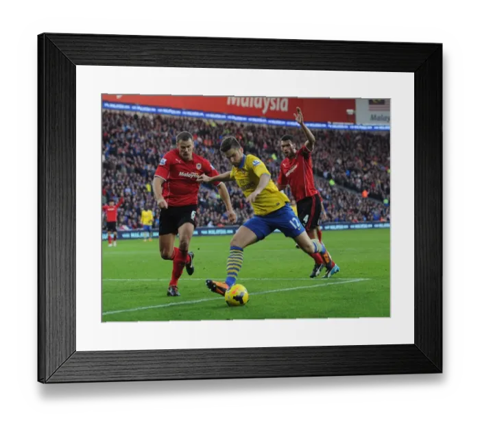 Framed Print : Giroud vs Turner: Intense Moment at Cardiff City Stadium - Arsenal vs Cardiff (2013-14) Framed Print : Giroud vs Turner: Intense Moment at Cardiff City Stadium - Arsenal vs Cardiff (2013-14)