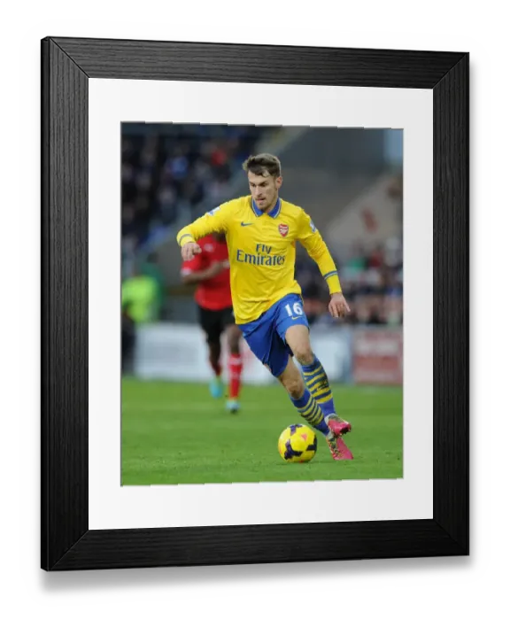 Framed Print : Aaron Ramsey in Action: Cardiff City vs Arsenal, Premier League 2013-14