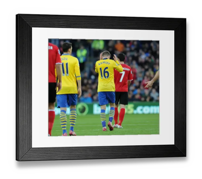 Framed Print : Aaron Ramsey celebrates scoring Arsenals 1st goal. Cardiff City 0: 3 Arsenal. Barclays