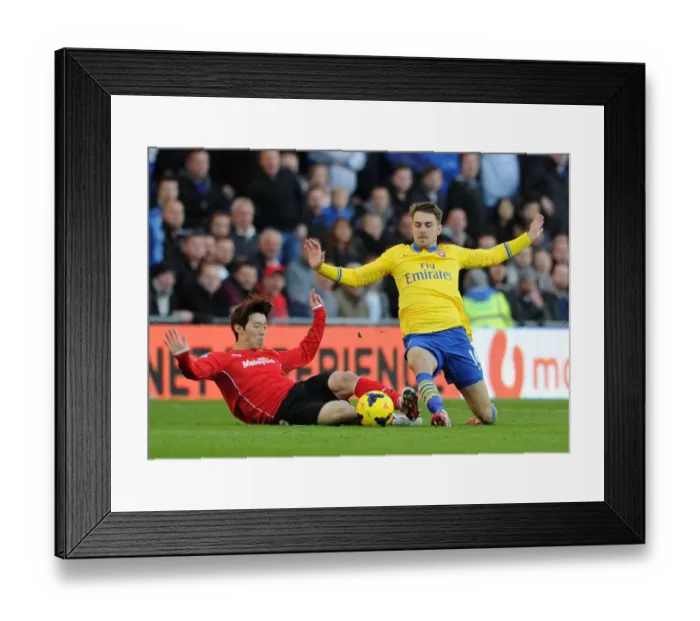 Framed Print : Aaron Ramsey Surges Past Kim Bo-Kyung: Cardiff City vs. Arsenal, Premier League 2013-14