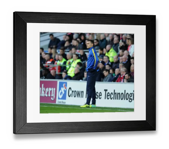 Framed Print : Thomas Vermaelen's Intense Focus at Cardiff City Stadium (Cardiff City vs Arsenal, Premier League 2013-14)