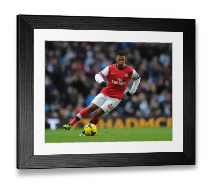 Framed Print : Serge Gnabry (Arsenal). Manchester City 6: 3 Arsenal. Barclays Premier League. Etihad Stadium