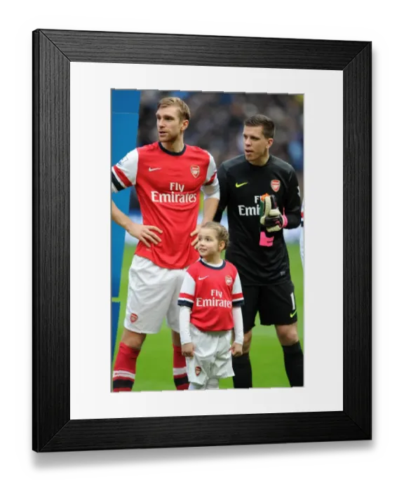 Framed Print : Arsenal Mascot with Per Mertesacker (Arsenal). Manchester City 6: 3 Arsenal. Barclays Premier League