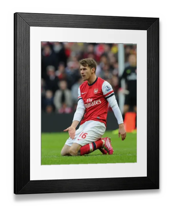 Framed Print : Aaron Ramsey in Action: Manchester City vs. Arsenal, Premier League 2013-14