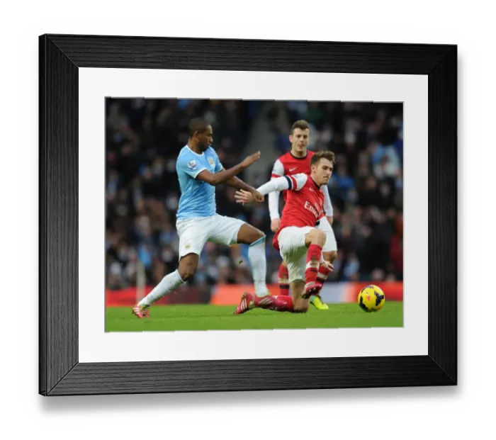 Framed Print : Ramsey vs Fernandinho: Intense Battle in Manchester City vs Arsenal (2013-14)
