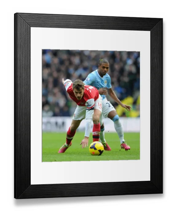 Framed Print : Clash of Midfield Titans: Ramsey vs. Fernandinho, Premier League Showdown, Manchester City vs. Arsenal, 2013 Framed Print : Clash of Midfield Titans: Ramsey vs. Fernandinho, Premier League Showdown, Manchester City vs. Arsenal, 2013