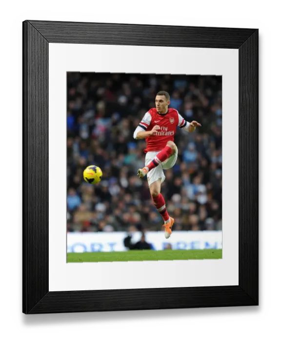 Framed Print : Thomas Vermaelen: In Action Against Manchester City - Premier League 2013-14 Framed Print : Thomas Vermaelen: In Action Against Manchester City - Premier League 2013-14