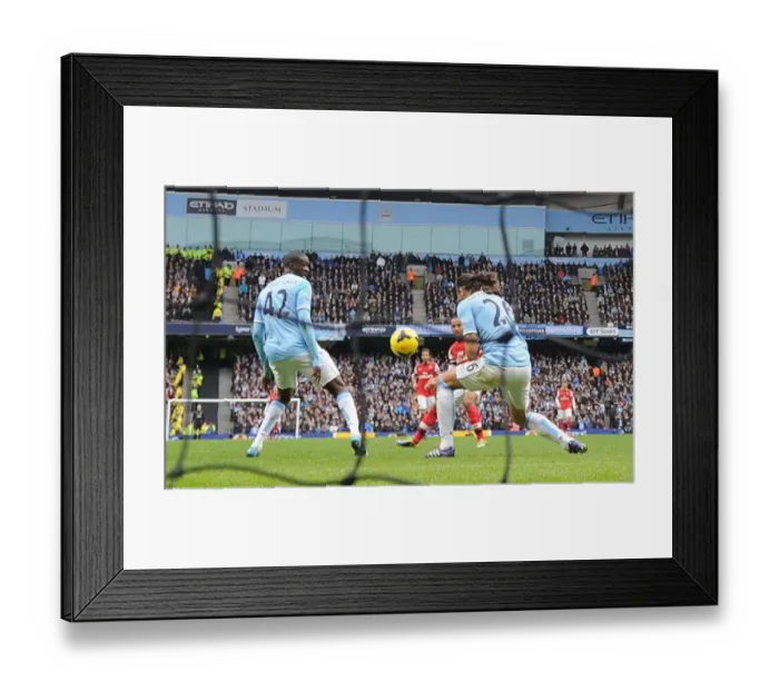Framed Print : Theo Walcott Scores Against Manchester City: A Premier League Rivalry (Manchester City vs Arsenal, 2013-14)