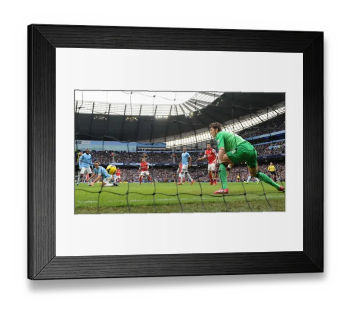 Framed Print : Theo Walcott Scores Against Manchester City: Yaya Toure, Martin Demichelis, and Costel Pantilimon