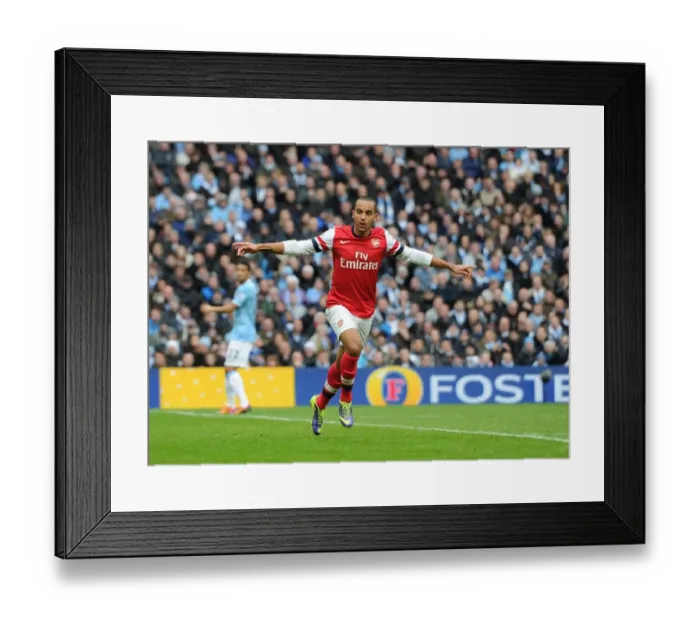 Framed Print : Theo Walcott's Thrilling Goal: Arsenal's Triumph Over Manchester City (Premier League 2013-14)