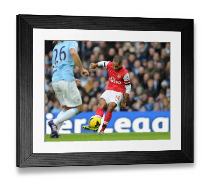 Framed Print : Theo walcott scores Arsenals and his 2nd goal. Manchester City 6: 3 Arsenal. Barclays Framed Print : Theo walcott scores Arsenals and his 2nd goal. Manchester City 6: 3 Arsenal. Barclays