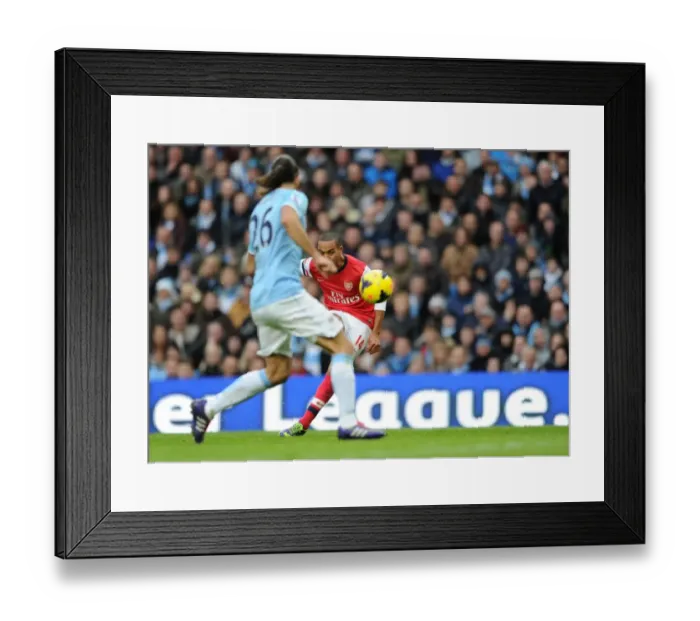 Framed Print : Theo Walcott Scores Arsenal's Second Goal: Manchester City vs Arsenal (2013-14) Framed Print : Theo Walcott Scores Arsenal's Second Goal: Manchester City vs Arsenal (2013-14)